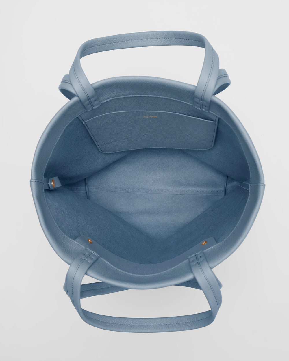 Open tote bag viewed from above with multiple handles and interior pocket.