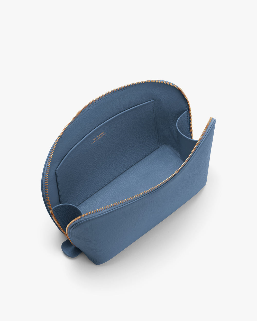 Open travel bag with a zip and internal pocket visible.
