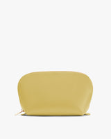 Rounded pouch with zipper on top.