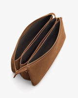 Open purse with two zippered compartments and two pockets inside.