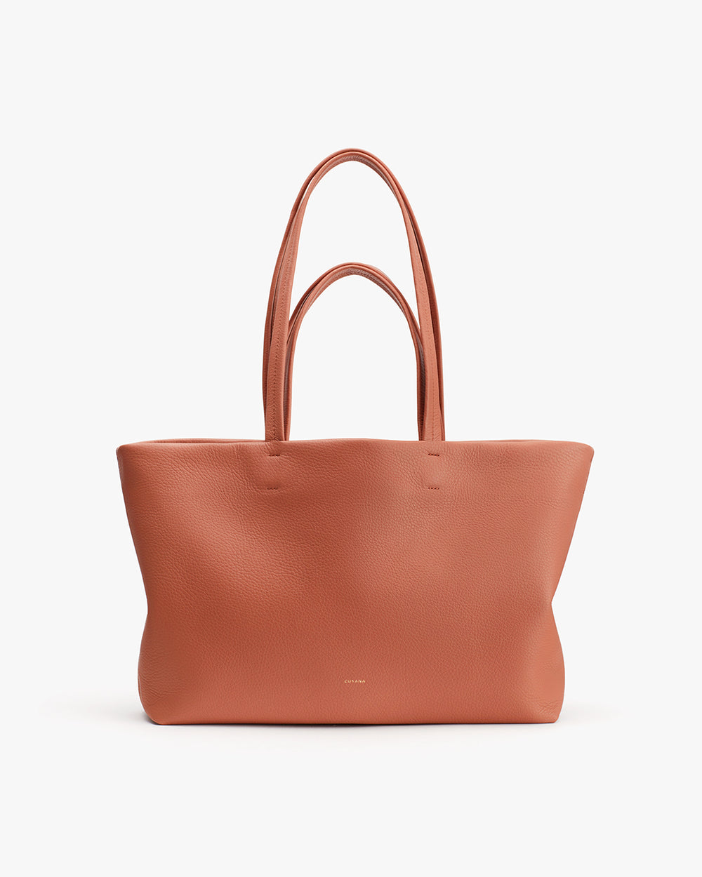 Tote bag with two handles standing upright against a plain background.