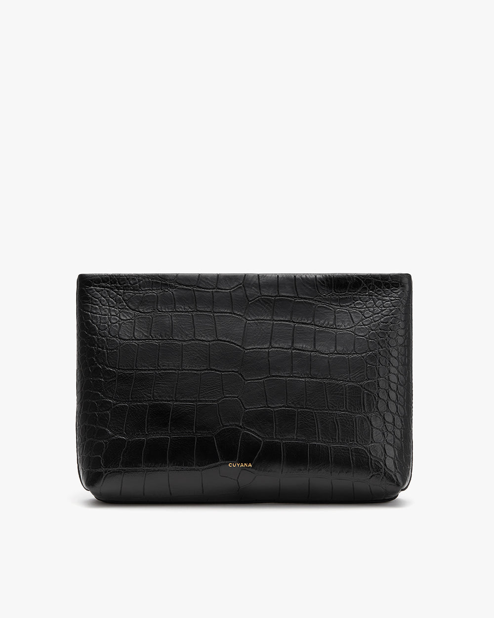 Croc-embossed leathered clutch purse on a plain background.