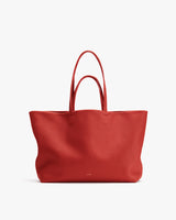 Large tote bag with twin handles shown against a plain background