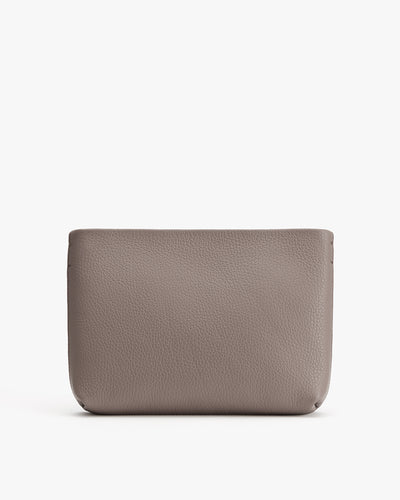 Small rectangular handbag with a textured surface.