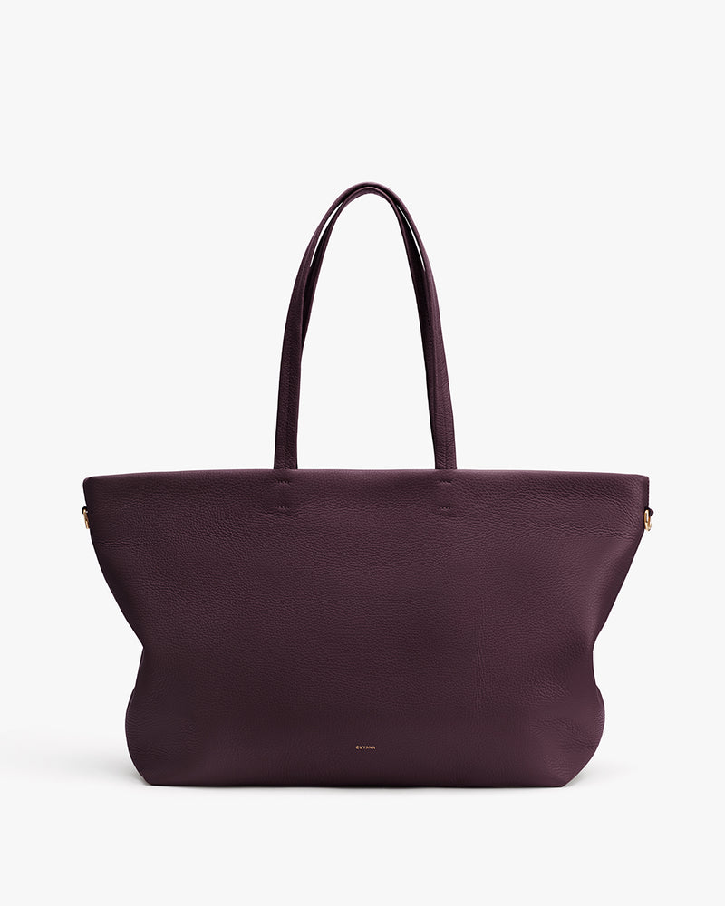 Large tote bag with long handles on white background