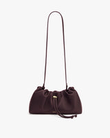Shoulder bag with drawstring closure and long strap