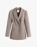 Tailored double-breasted blazer with two buttons and notched lapels.