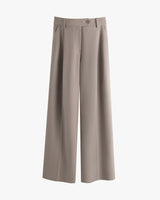 Wide-leg trousers with button and belt loops.
