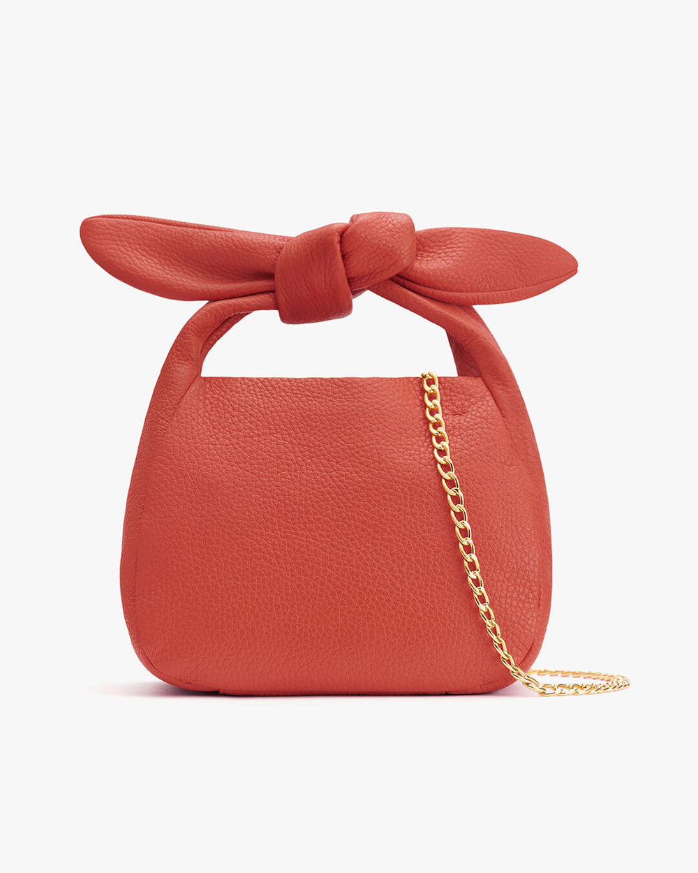 Handbag with a bow on top and a chain strap