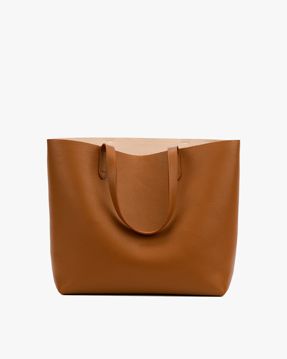 Leather tote bag on a white background.