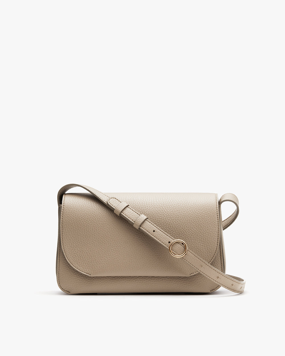 Small shoulder bag with a flap front and circular clasp.