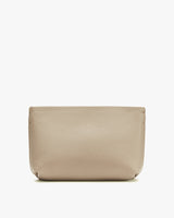 Leather pouch on a plain background