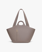 Handbag with short handles and front zip pocket