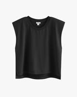 Sleeveless top with a rounded neckline displayed on a white background.