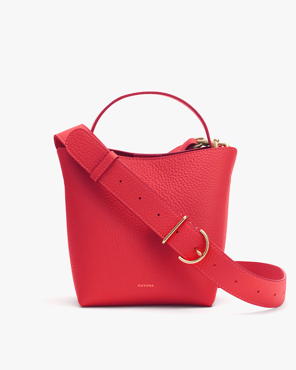 Handbag with a top handle and detachable shoulder strap.