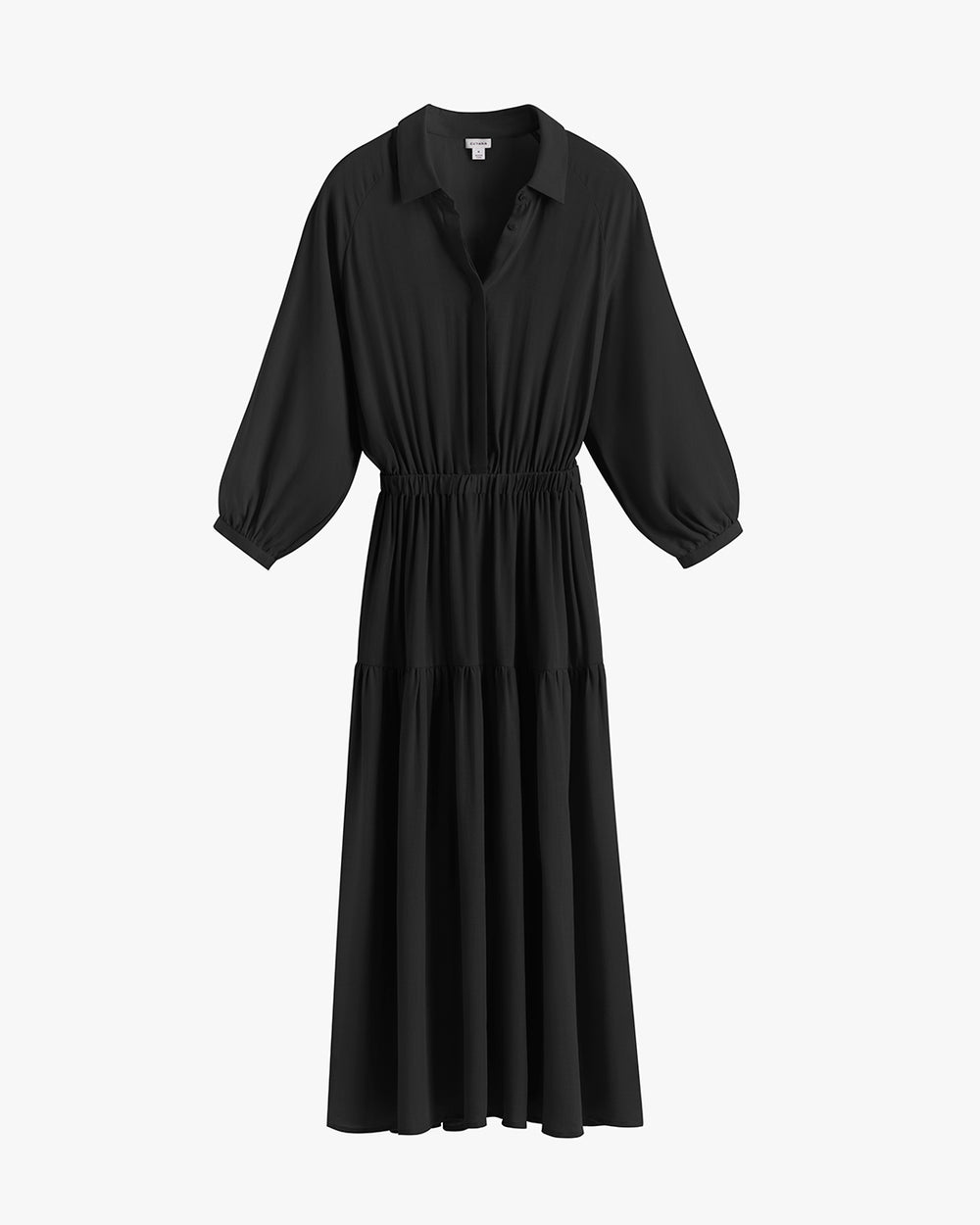 Long-sleeved dress with collar and gathered waist.