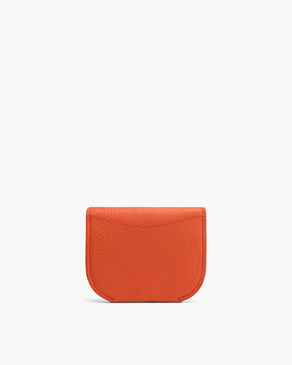 Small leather cardholder on a plain background