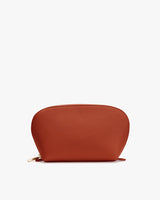 Rounded zip pouch on white background.