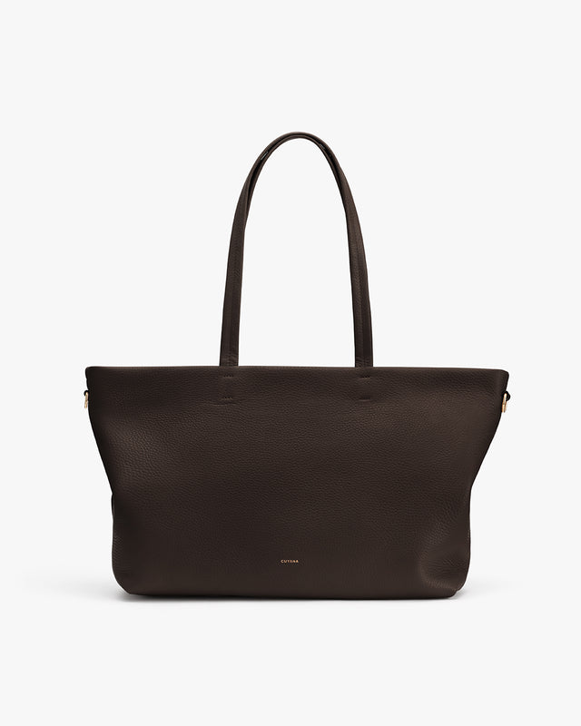 Tote bag with long handles and minimalist design.