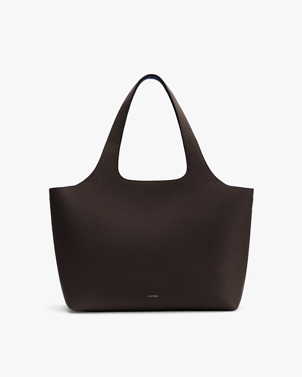 Handbag with two handles and pebbled leather surface on plain background