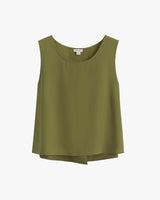 Sleeveless top with scoop neckline on white background