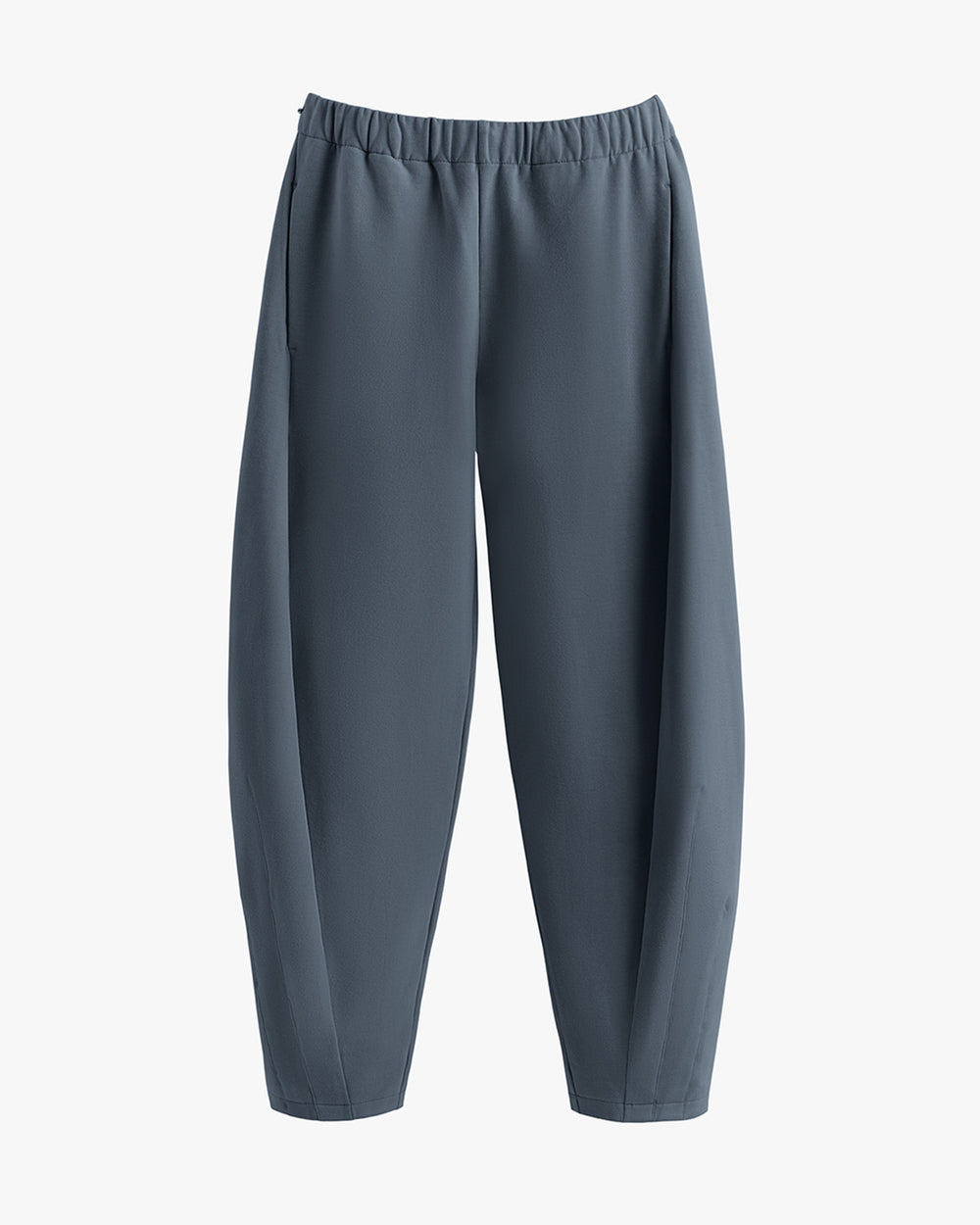 Loose-fit pants with elastic waistband on a plain background.