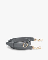 Shoulder strap with gold clasps and circular ring attachment