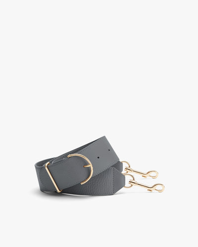Wide strap with metal clasps and a buckle.