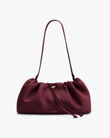 Shoulder bag with drawstring closure and long strap