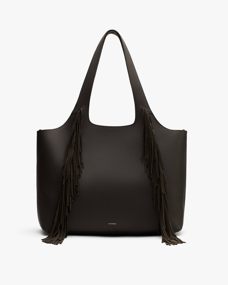 Tote bag with long fringes on both sides.