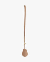 Small pouch with a long strap attached at the top.