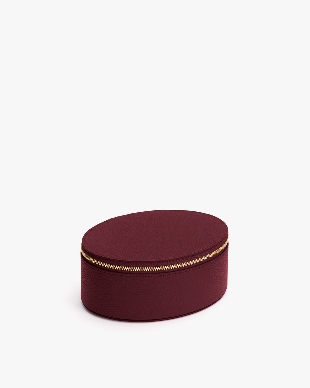 Oval zippered travel case on white background