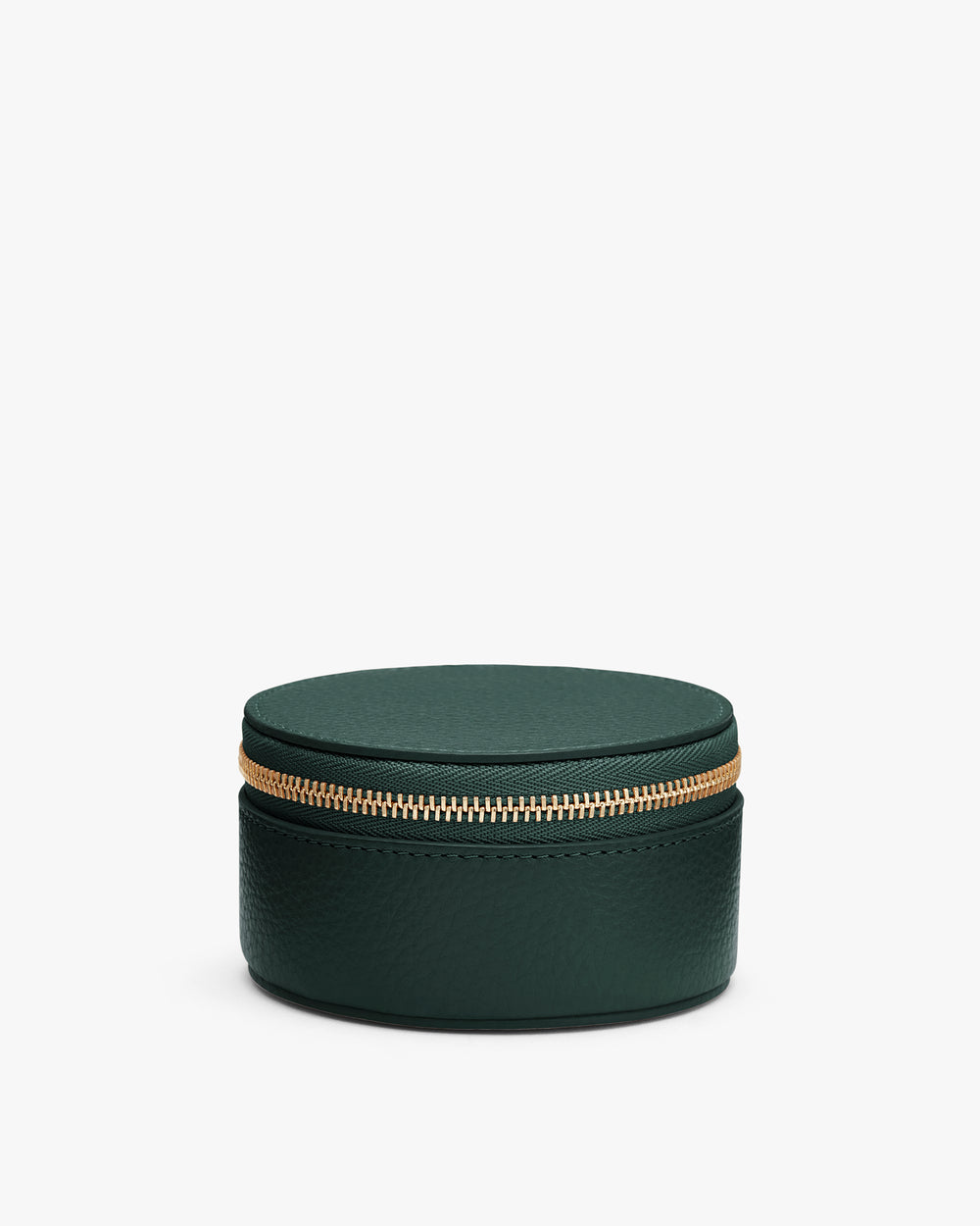 Round zippered leather case against white background