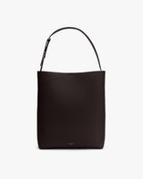 Simple leather tote bag with a single strap.
