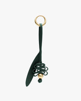 Keychain with loop strap and decorative knot.