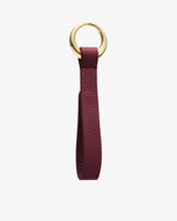 Keychain with a loop and metal ring.