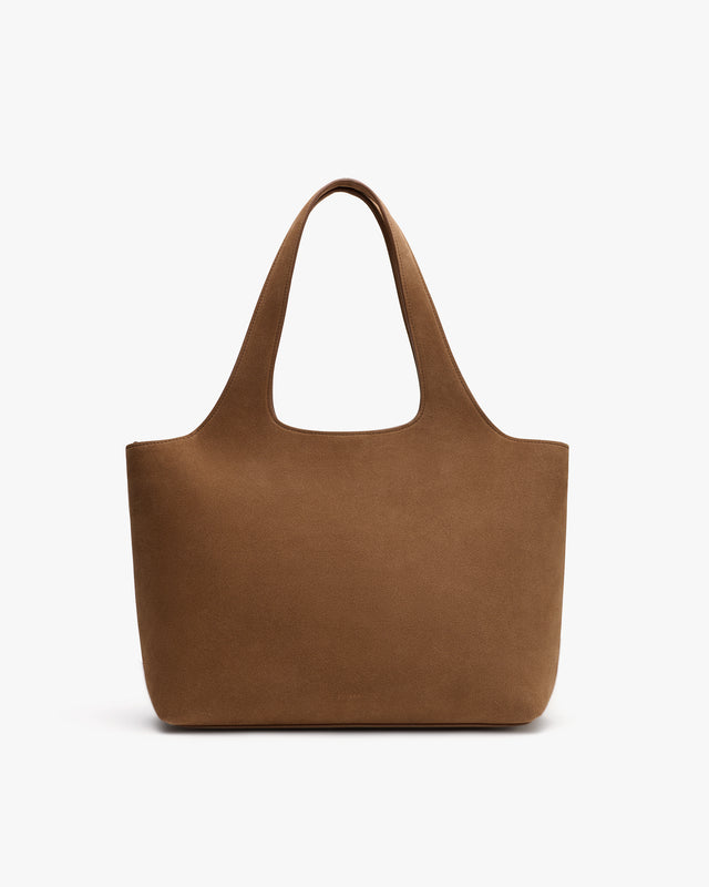 Handbag with wide handles and a simple design.