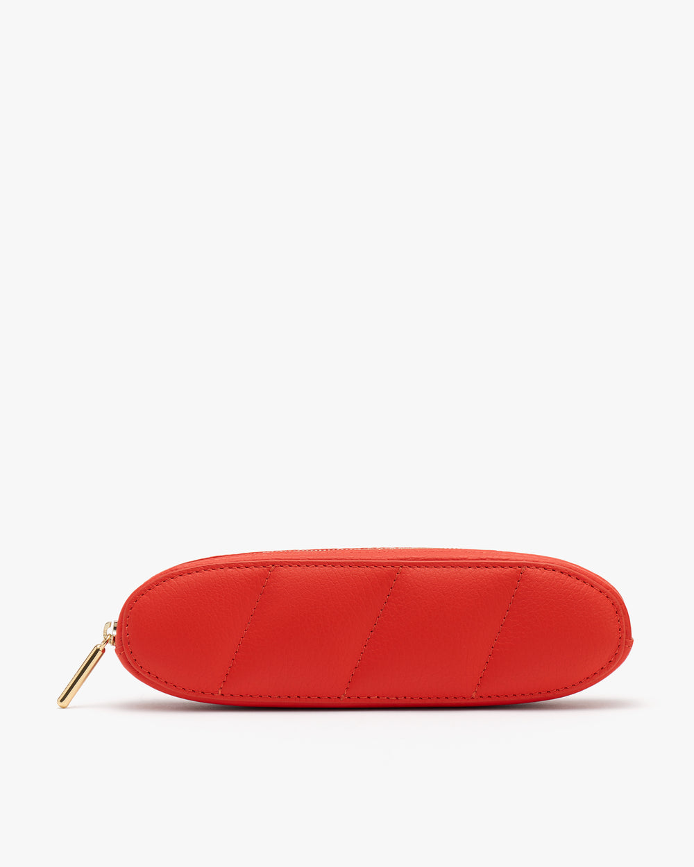 Oval-shaped quilted pouch with a zipper.
