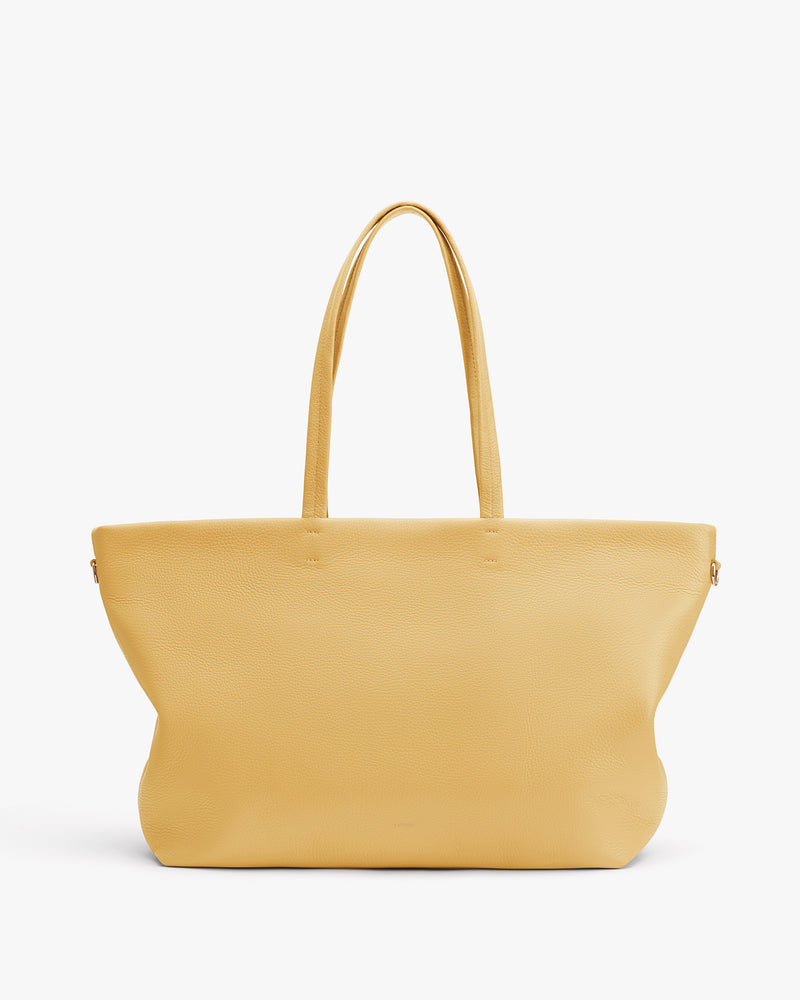 Large tote bag with two handles shown against plain background.