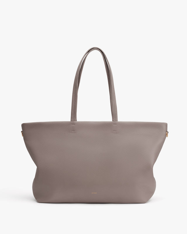 Large tote bag with two handles.
