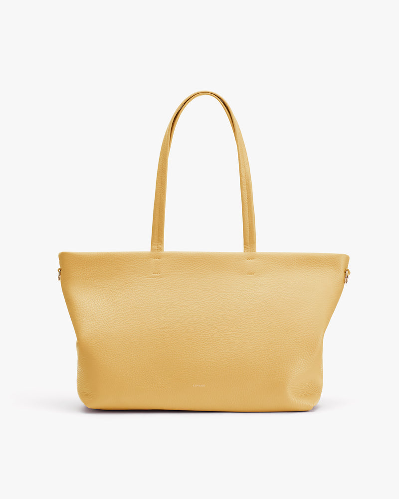 Tote bag with two handles displayed upright on plain background