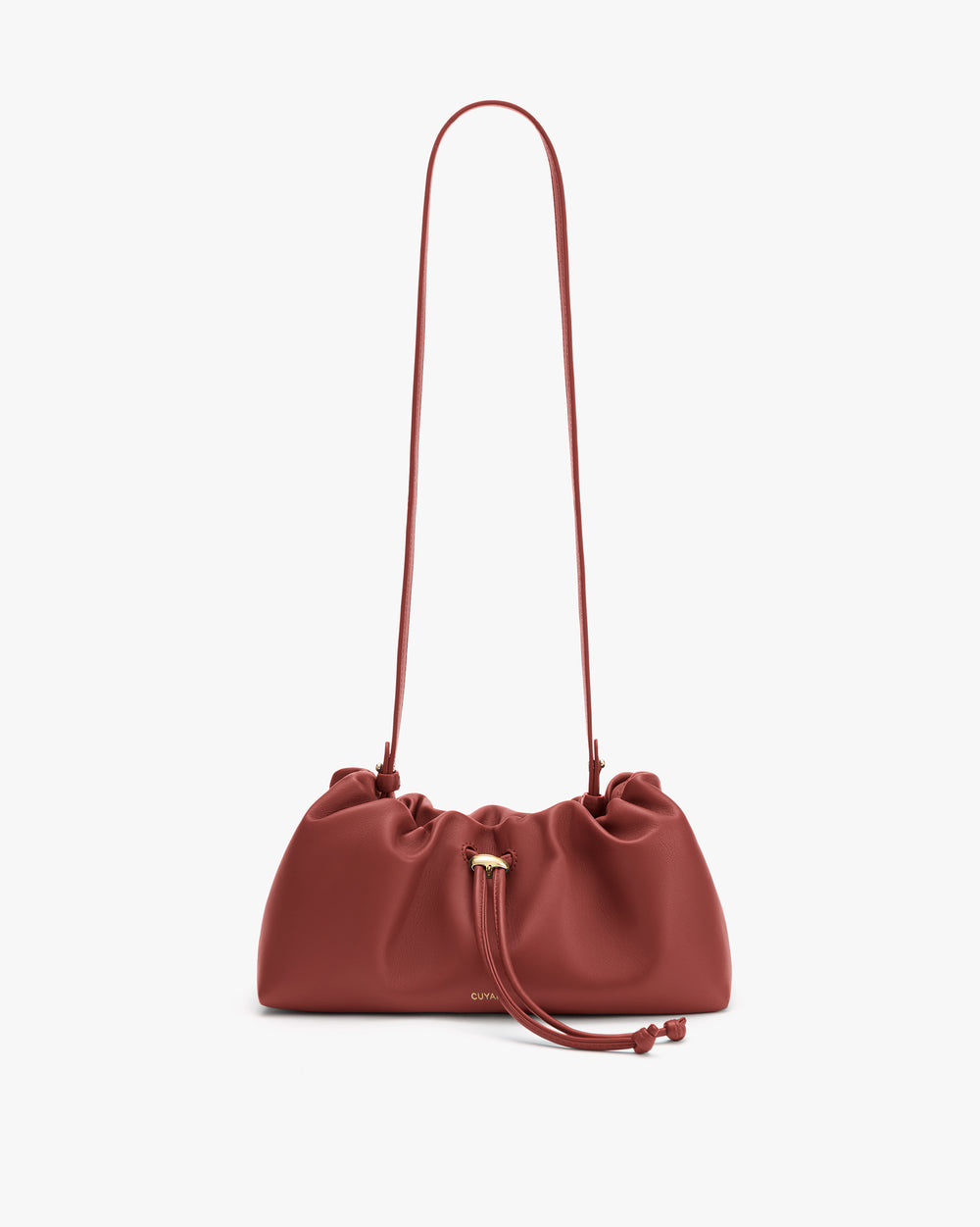 Gathered drawstring shoulder bag with long strap.