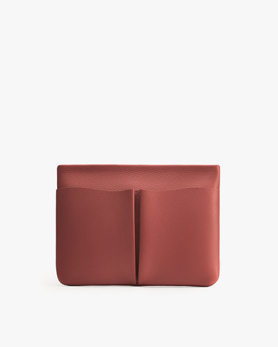 Leather pouch with two front pockets and simple design.