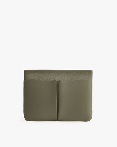 Rectangular leather clutch with a minimalist design and a front pocket.