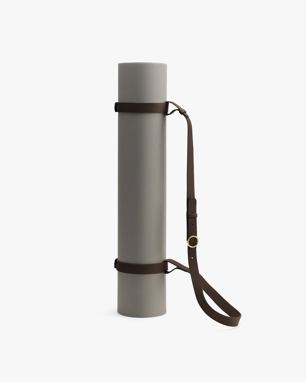 Rolled yoga mat with strap for carrying.