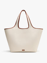 Large tote bag with two handles and small logo on the front.