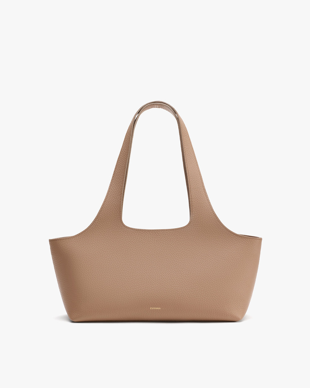 Handbag with long handles on plain background.