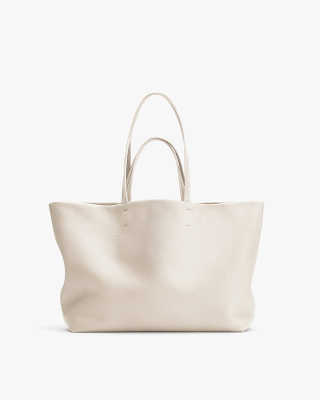 Large tote bag with two handles and an open top.