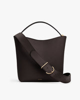 Bucket bag with a single handle and adjustable shoulder strap