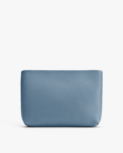 A simple leather pouch with a textured surface.
